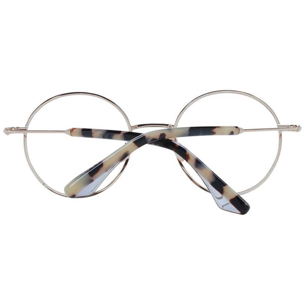 Round stainless steel glasses with tortoiseshell temples, showing unique design and style.
