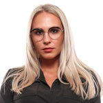 Woman wearing Emilio Pucci Black Women Glasses Frame with full-rim black design and metal-plastic material.