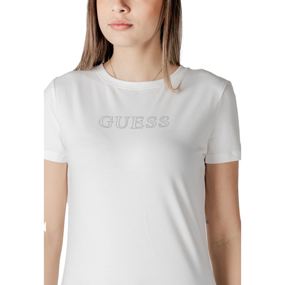 Woman wearing Guess Active White Cotton T-Shirt with logo, short sleeves, and a comfortable fit, ideal for casual and sporty outfits.