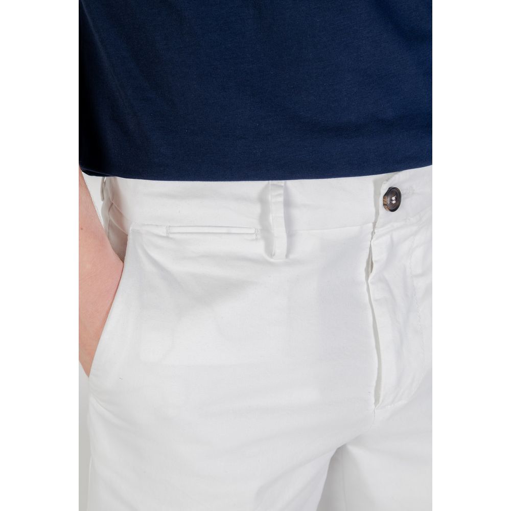 Close-up of Borghese White Cotton Bermuda Shorts showcasing pocket and button details.