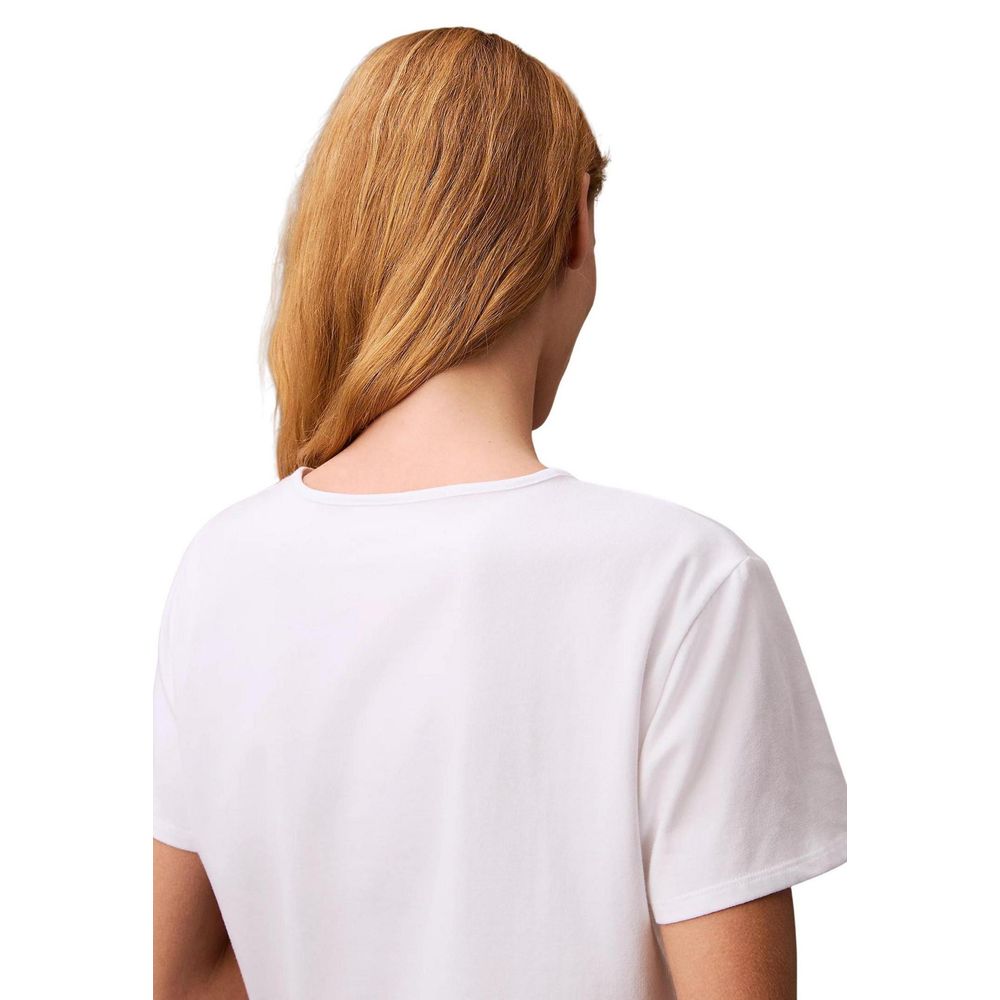 Back view of Calvin Klein Jeans White Recycled Cotton T-Shirt on a model, showcasing simple design and eco-friendly fabric.