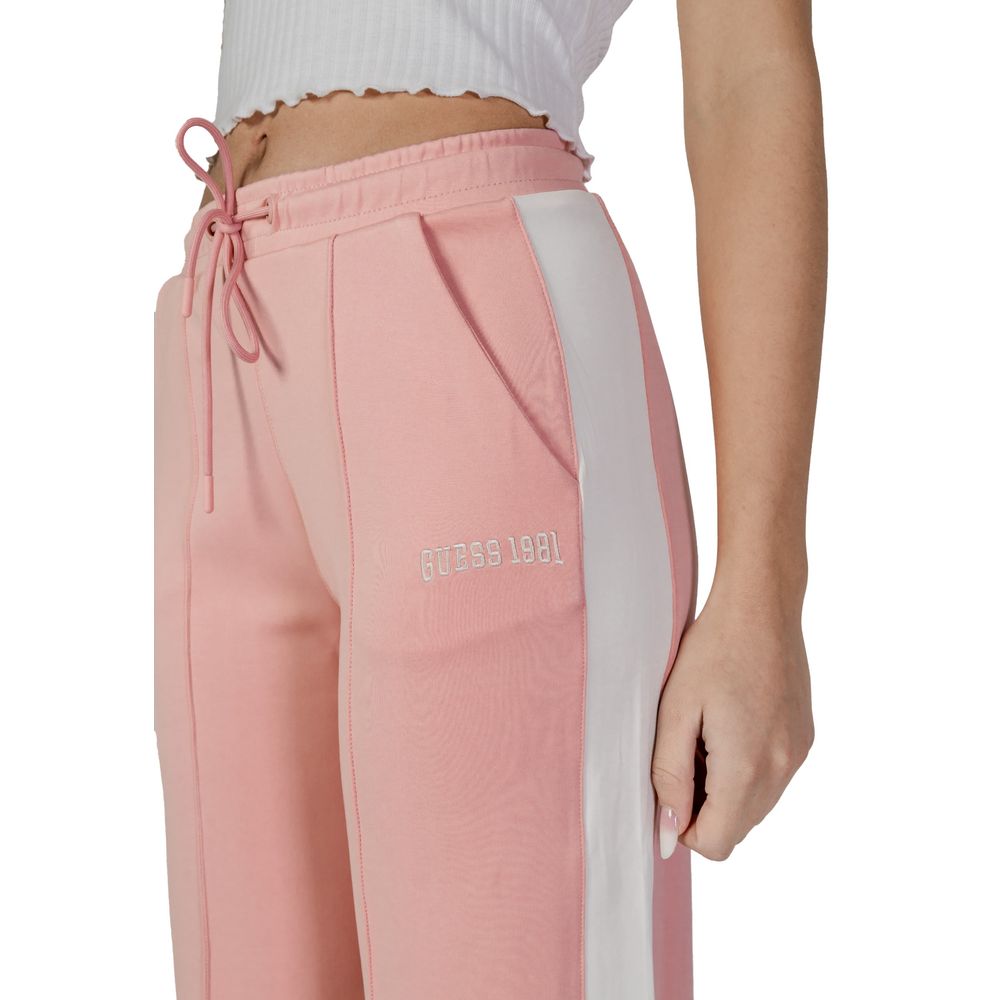 Close-up of woman wearing Guess Active Multicolor Polyester Joggers with side pockets and drawstring, ideal for workouts.