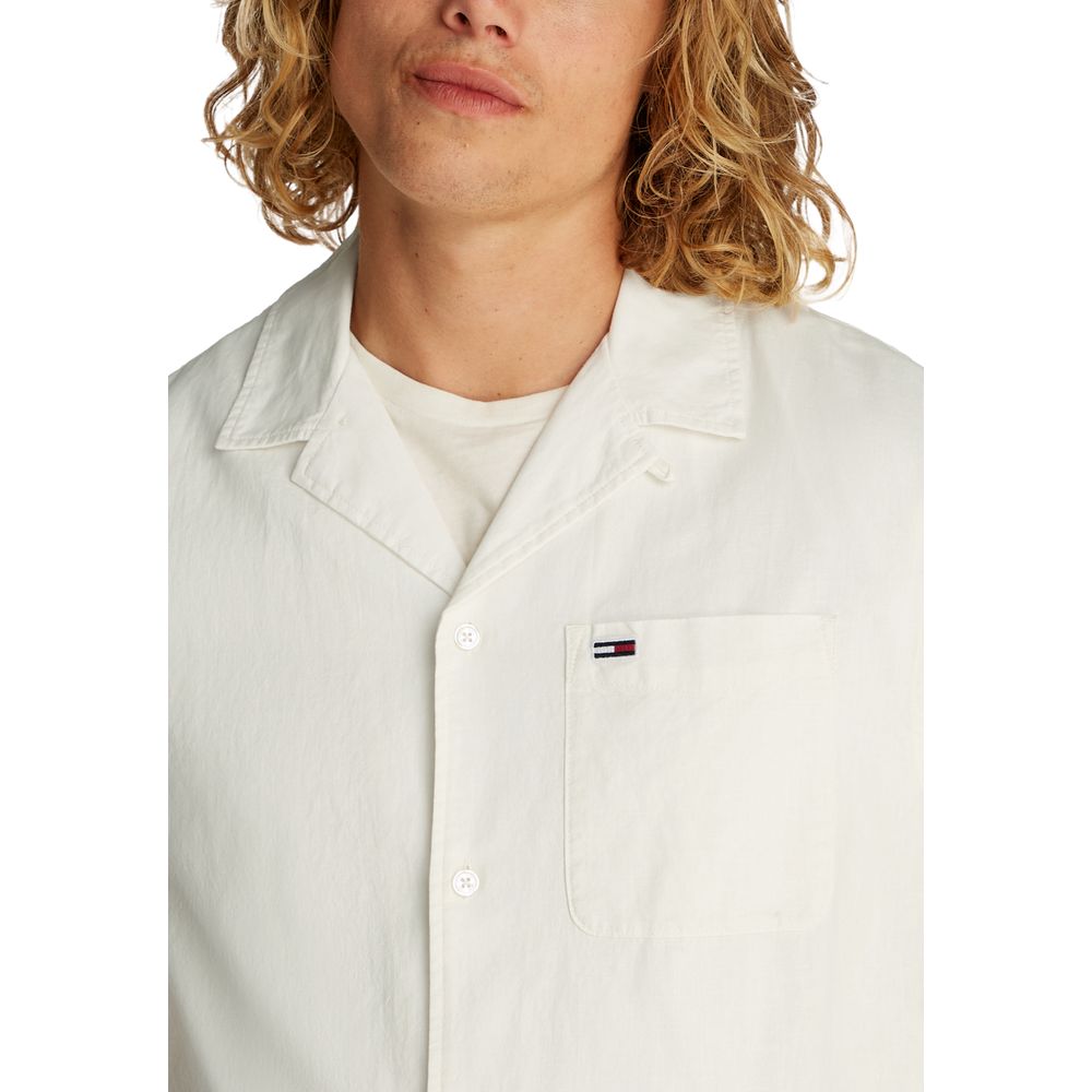 Tommy Hilfiger Jeans Cream Cotton Shortsleeve Shirt with logo detail and casual collar.