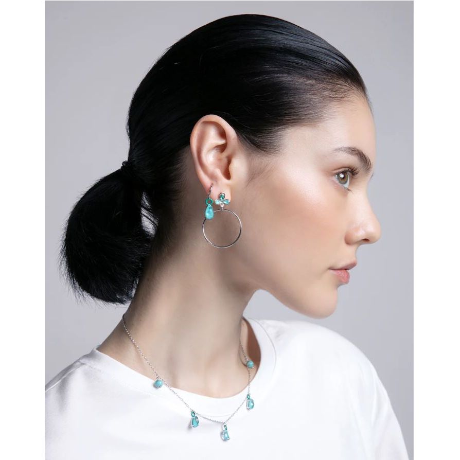 Model wearing VICEROY JEWELS Mod. 13198E000-33 earrings with turquoise accents and matching necklace, showcasing elegant silver jewelry.