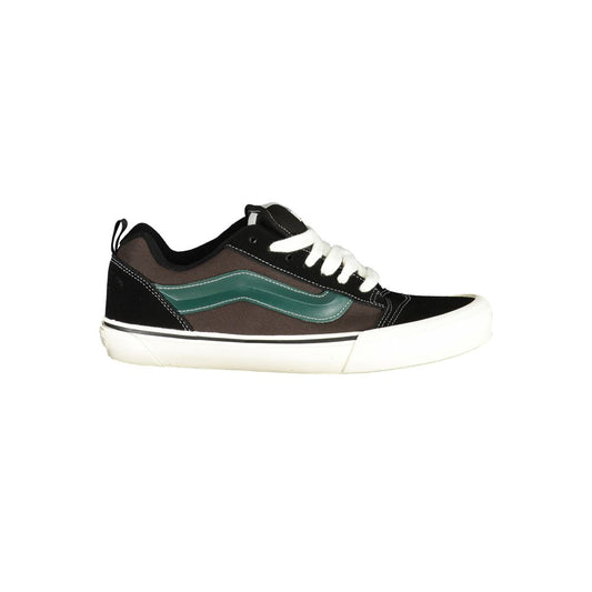 Vans Black Leather Men Sneaker with green details, featuring classic design and street style flair, perfect for urban and skatepark adventures.