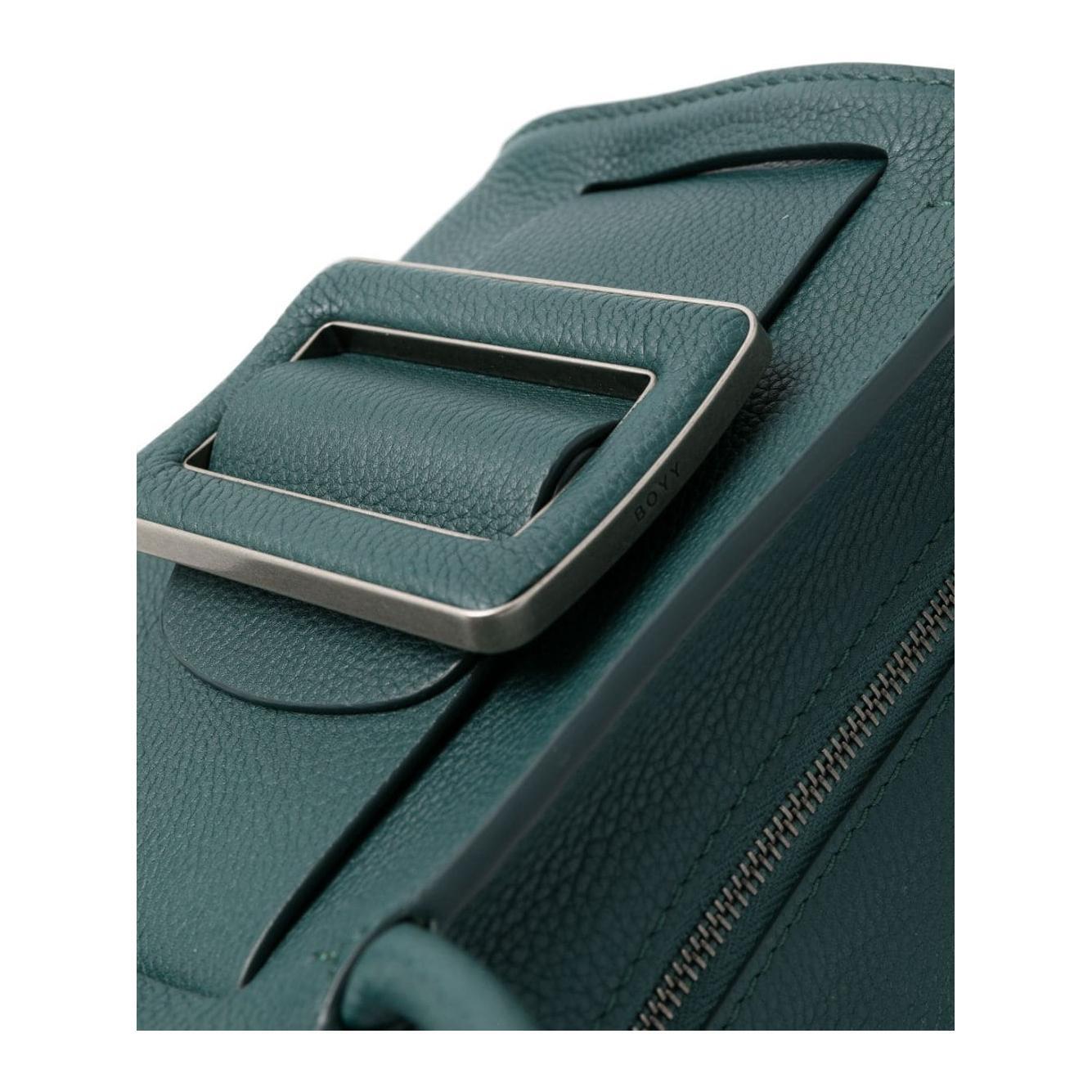 Front view with bag zipped and handles upright.