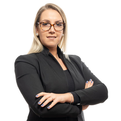 Woman wearing Emilio Pucci Brown Plastic Glasses (Frames) with arms crossed, stylish and confident look in professional attire.