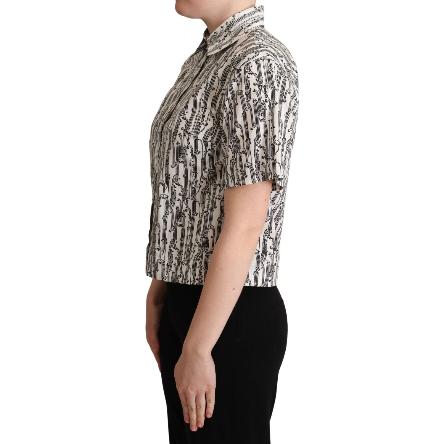 قميص بولو قطني أنيق مزين بالزهور من دولتشي آند غابانا