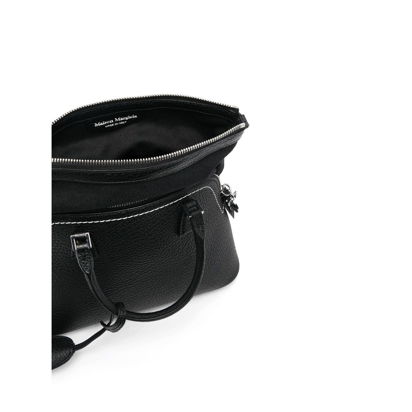Front view with bag zipped and handles upright.