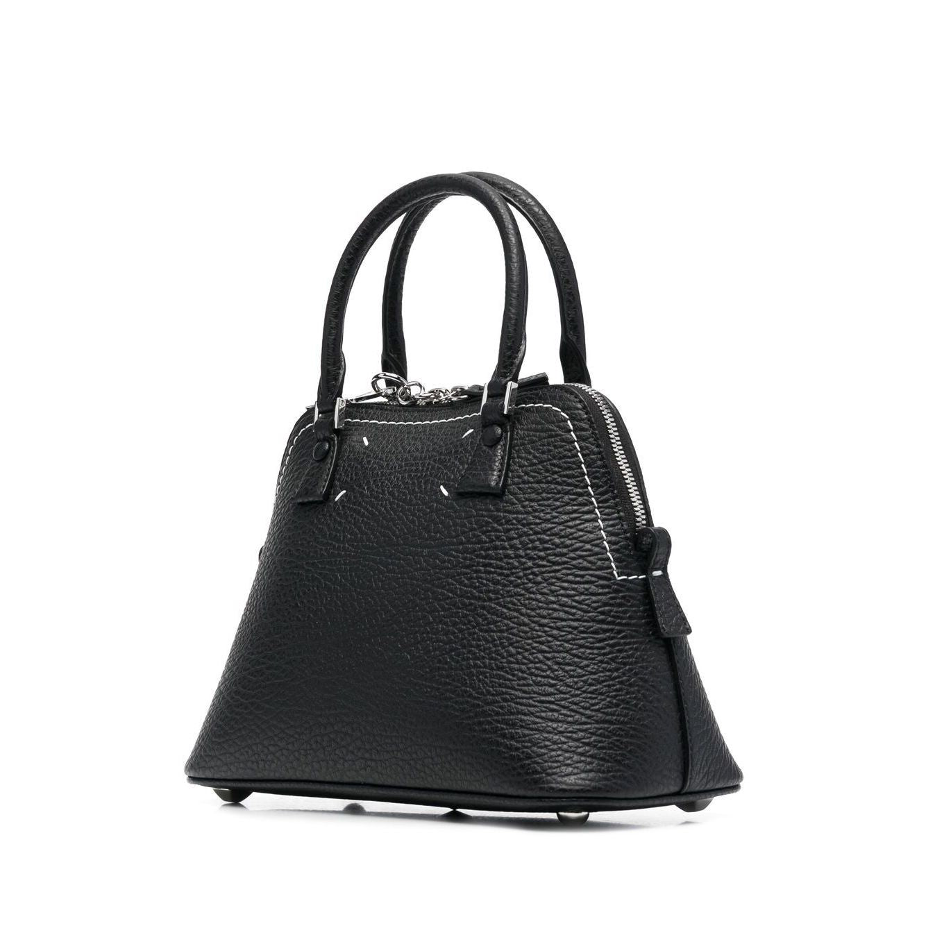 Front view with bag zipped and handles upright.