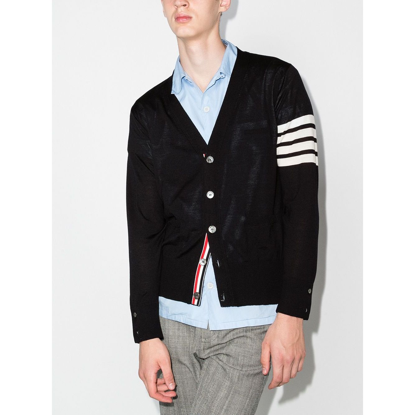 Thom Browne Sweaters Blue merino wool cardigan with signature 4-Bar stripe, navy blue color, front button fastening, long sleeves.