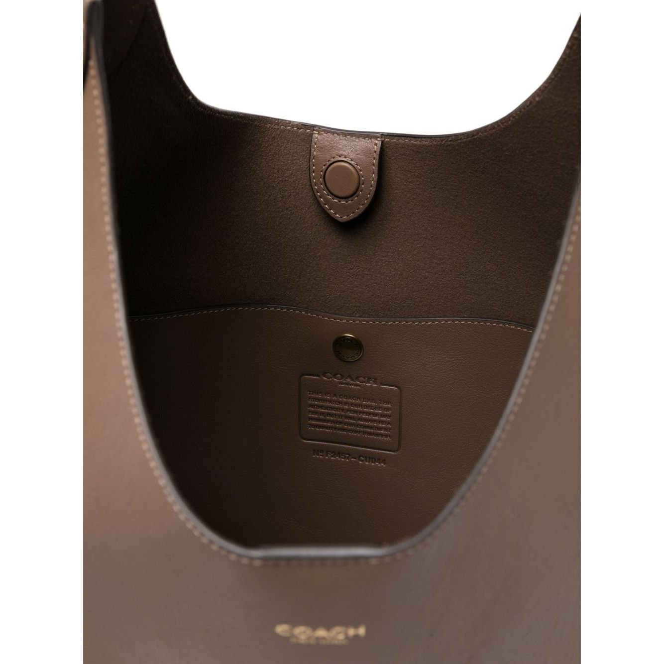 Front view with bag zipped and handles upright.