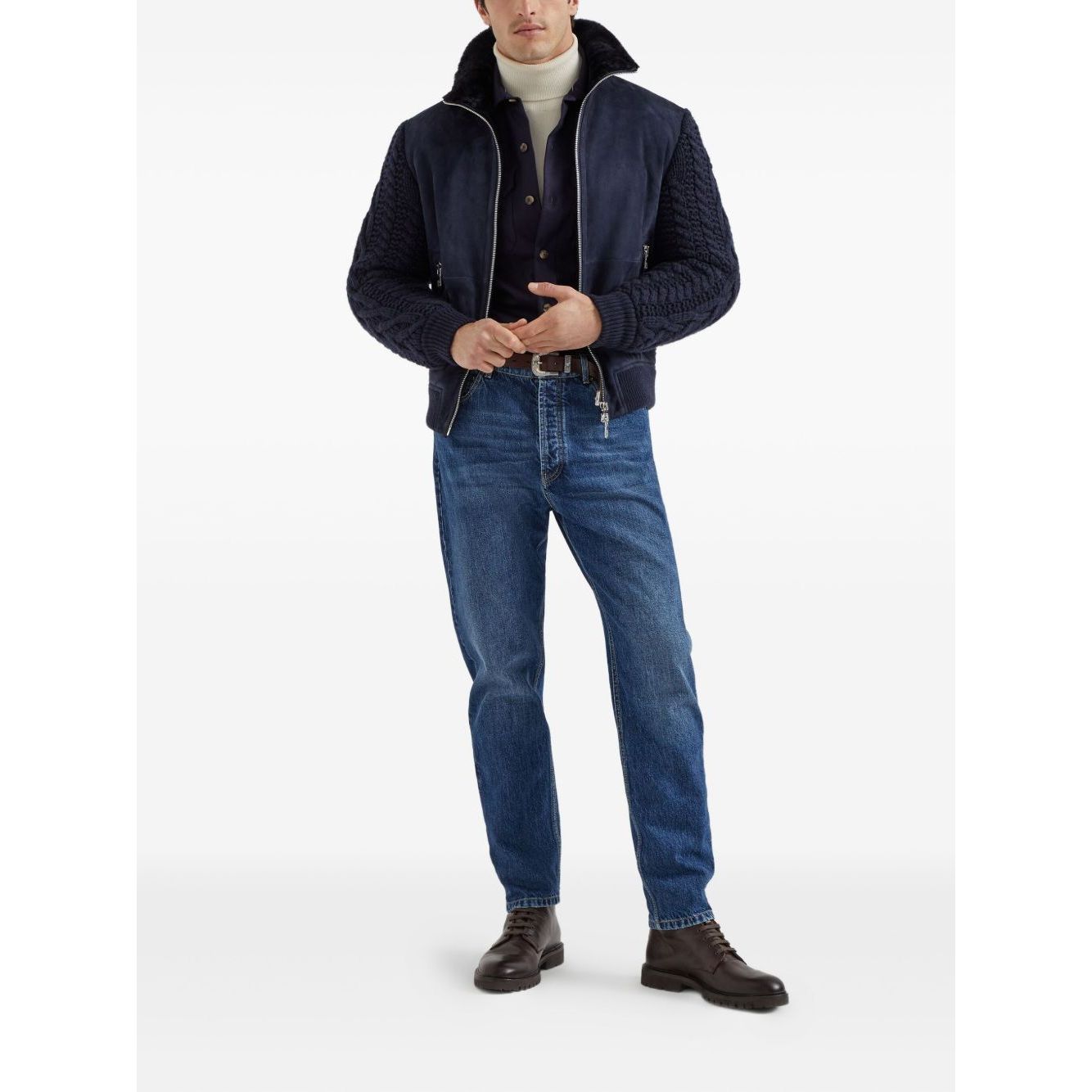 Model wearing Brunello Cucinelli Shirts Blue with blue wool shirt, long sleeves, and buttoned cuffs, styled with a jacket and jeans.