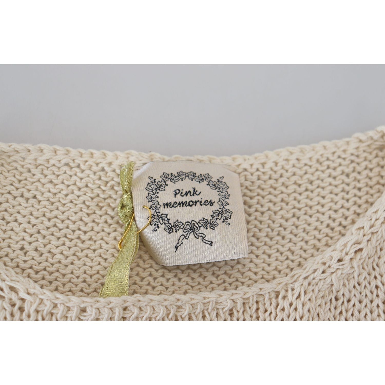 PINK MEMORIES بلوزة بدون أكمام أنيقة باللون البيج