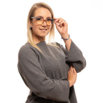 Woman wearing Yohji Yamamoto Brown Women Glasses Frame, full-rim rectangular plastic frame with demo lenses, styled in a casual look.