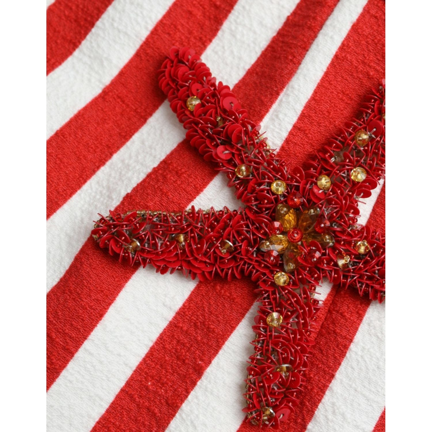 فستان دولتشي آند غابانا ميدي بدون أكمام بنقشة زهور باللونين الأحمر والأبيض