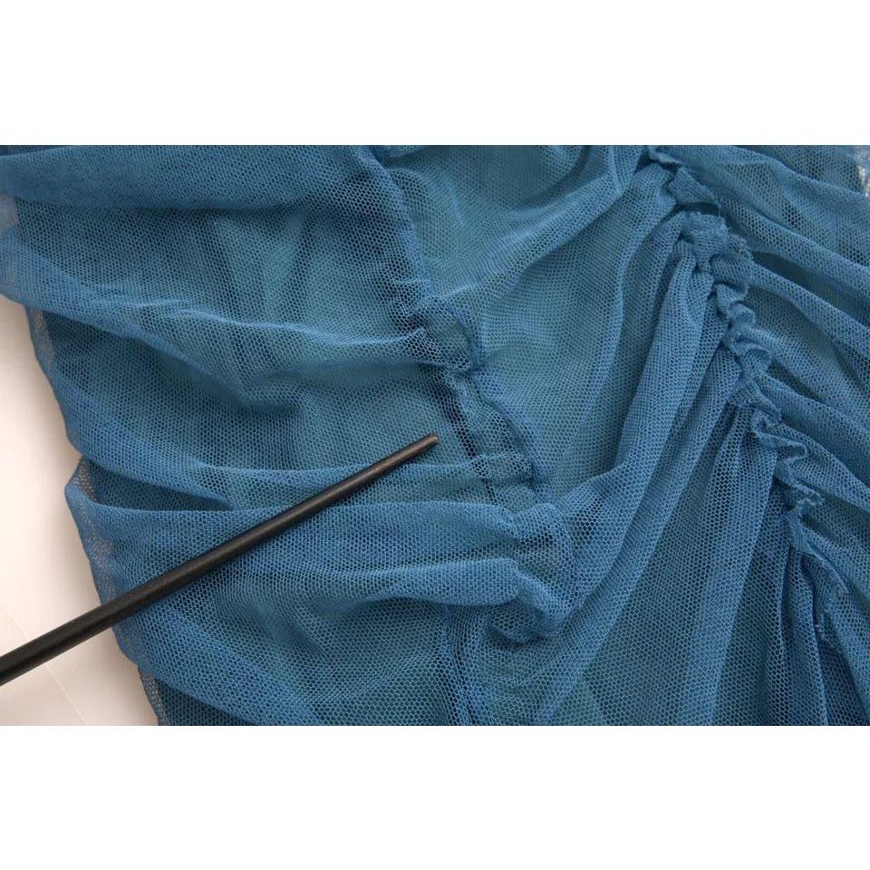 فستان دولتشي آند غابانا من التول المكشكش ذو الحواف الشبكية باللون الأزرق