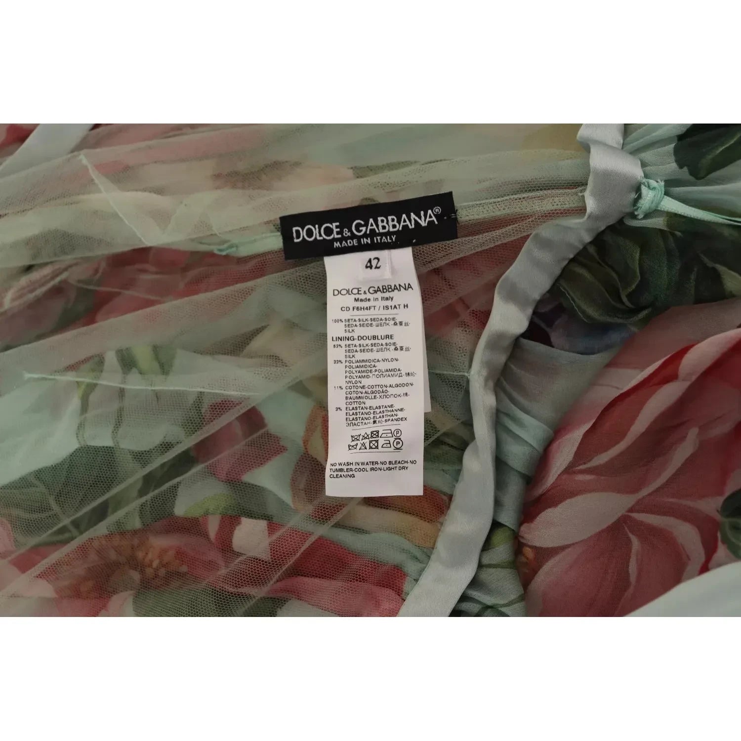 فستان دولتشي آند غابانا الأخضر المزهر بأكمام طويلة ورقبة على شكل حرف V