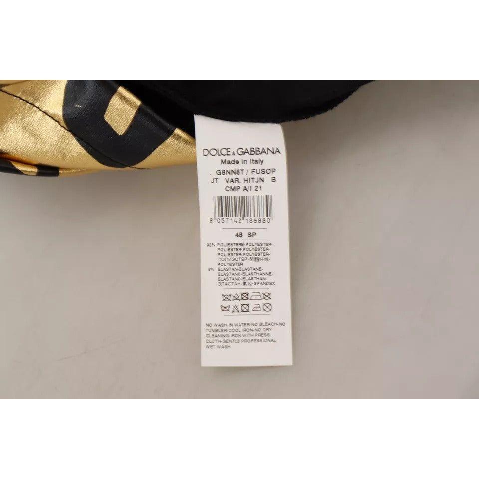 سترة صوفية بطبعة شعار دولتشي آند غابانا باللون الذهبي بياقة مدورة