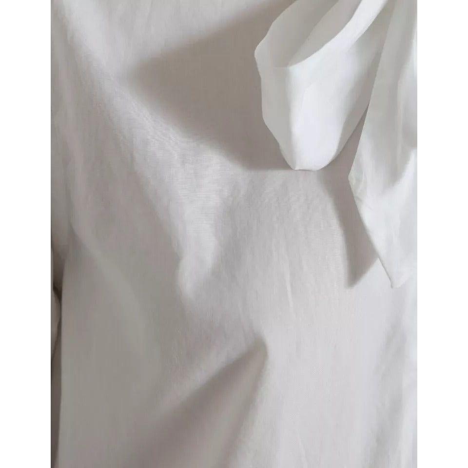 بلوزة دولتشي آند غابانا من القطن باللون الأبيض بياقة أسكوت وأكمام طويلة