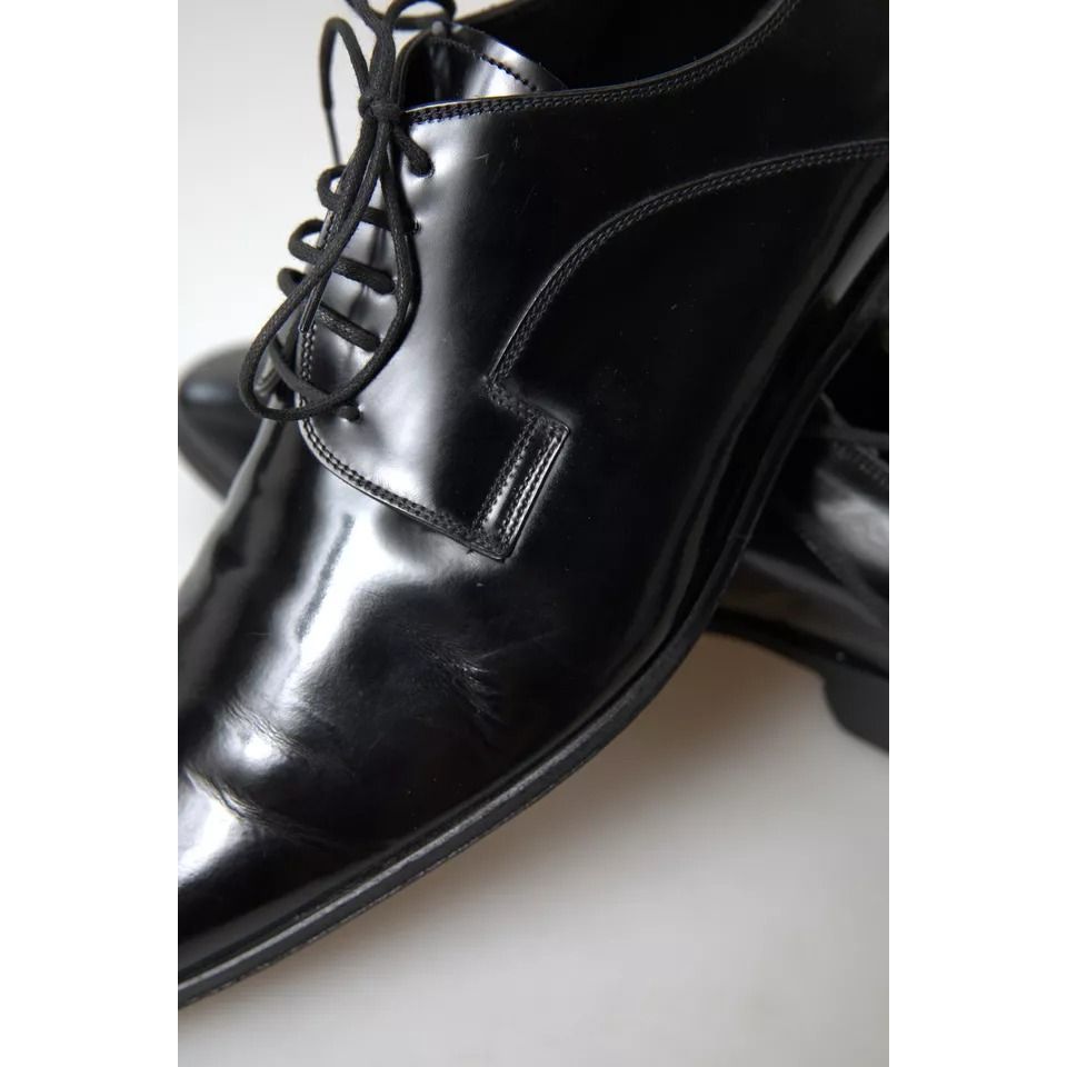 Dolce & Gabbana Black Polished Leather Formal Dress Shoes with slight wear, authentic luxury footwear made in Italy.