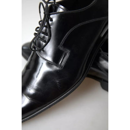 Dolce & Gabbana Black Polished Leather Formal Dress Shoes with slight wear, authentic luxury footwear made in Italy.
