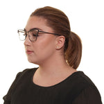 Woman wearing Yohji Yamamoto Gray Women Glasses Frame in gunmetal, full-rim style with a square design, made of titanium.