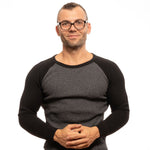 Person wearing Zadig & Voltaire Black Unisex Glasses Frame against a white background.