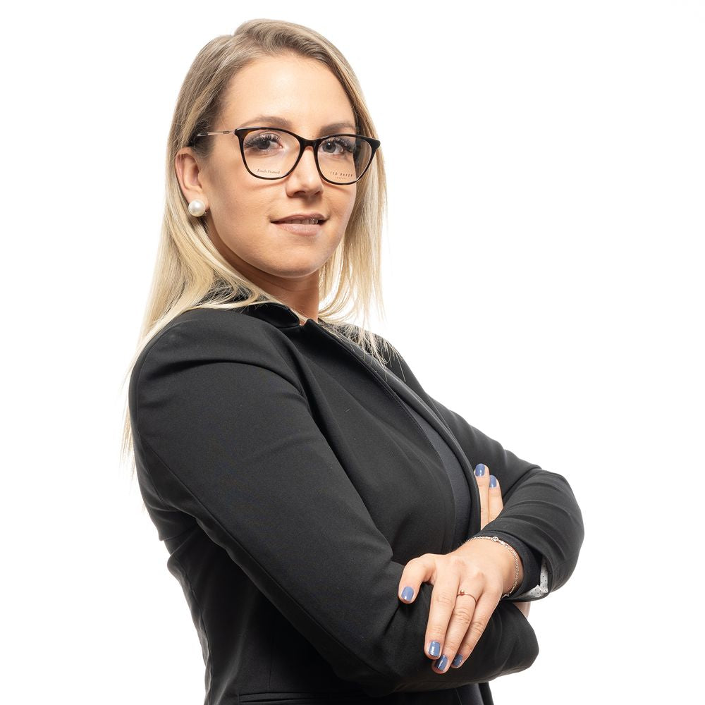 Woman wearing Ted Baker Brown Women Glasses Frame, full-rim plastic design, brown color, stylish and modern look.