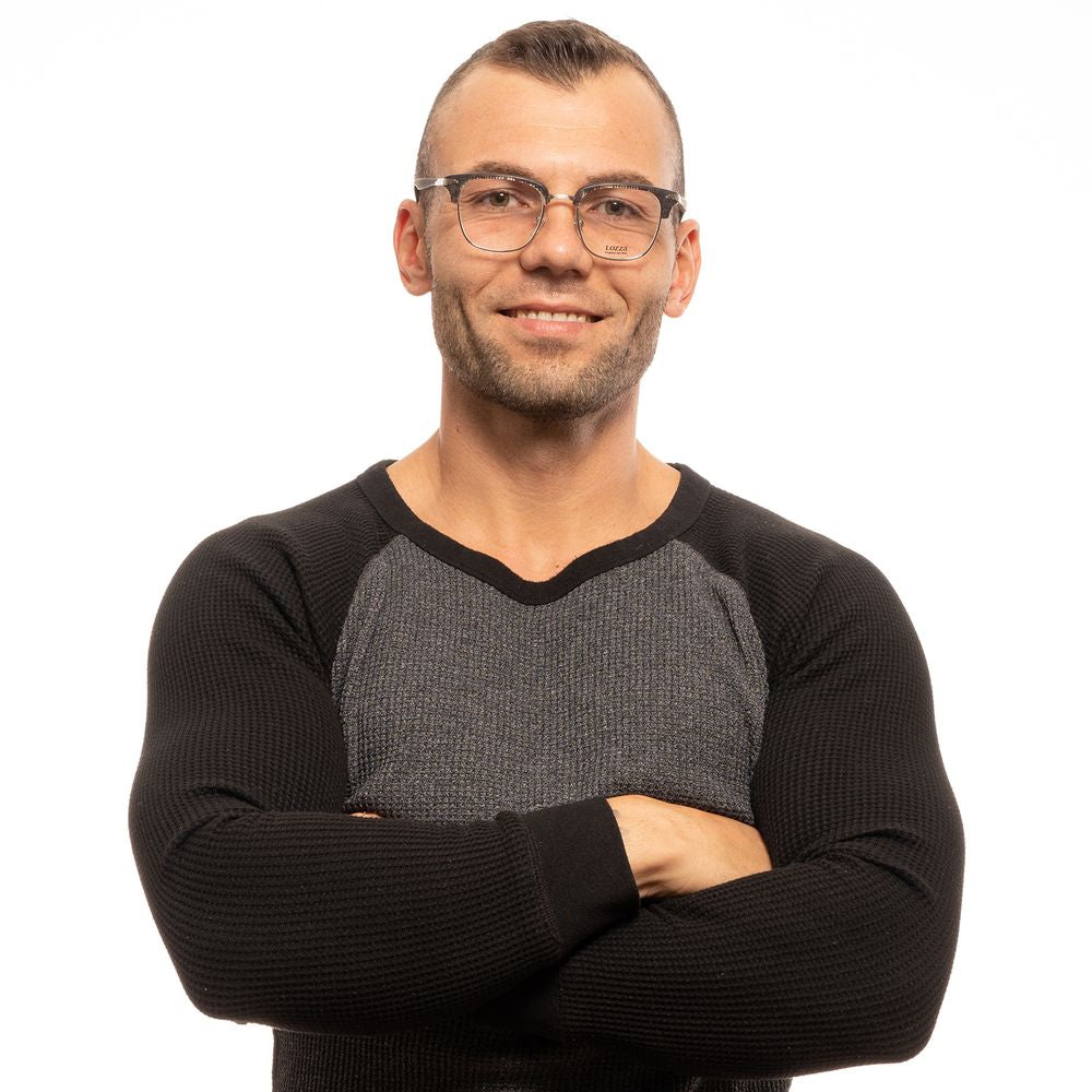 Man wearing Lozza Brown Unisex Glasses Frame with brown trapezium full-rim design and plastic lenses, arms crossed.