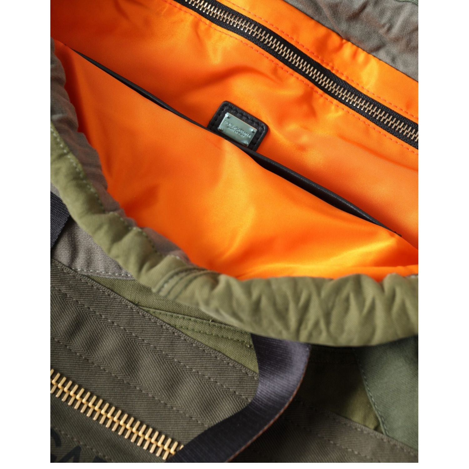 Front view with bag zipped and handles upright.