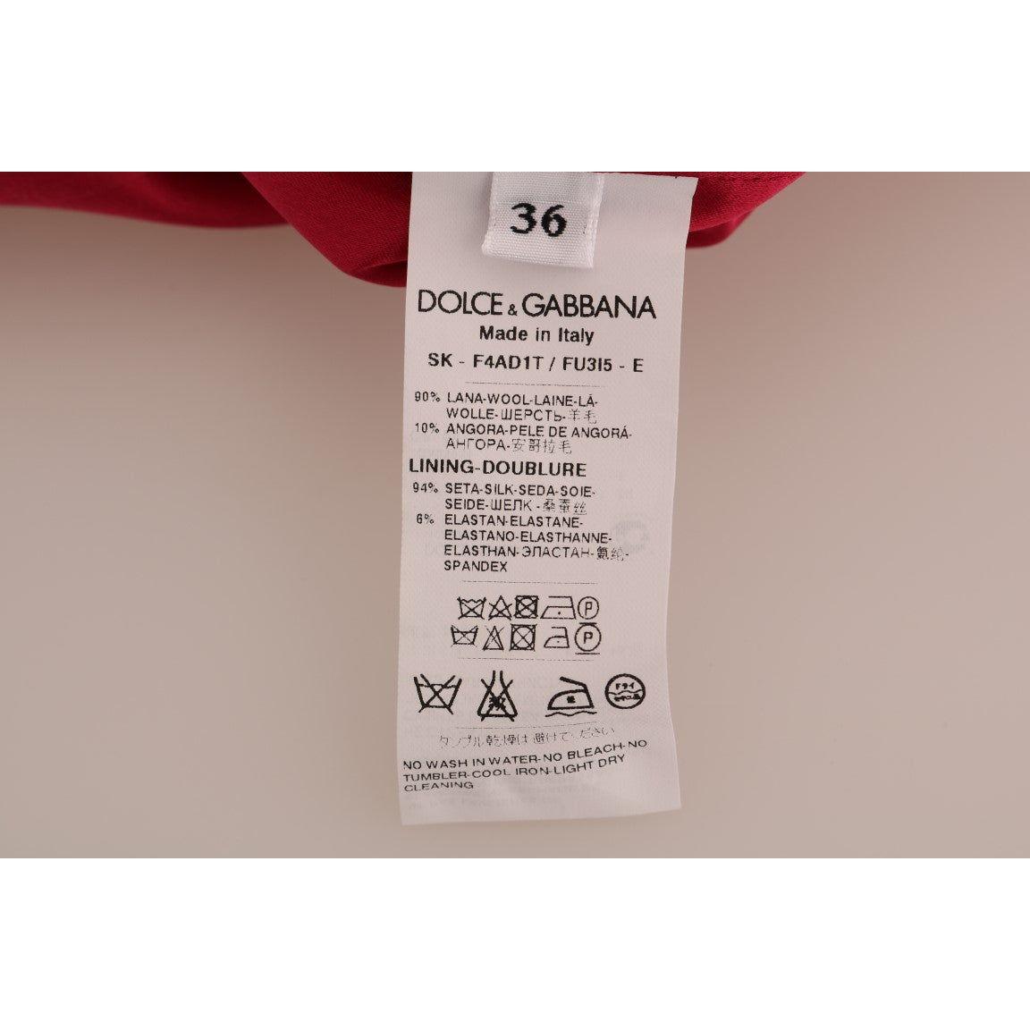 تنورة أنيقة من الصوف باللون الوردي من دولتشي آند غابانا بطول الركبة