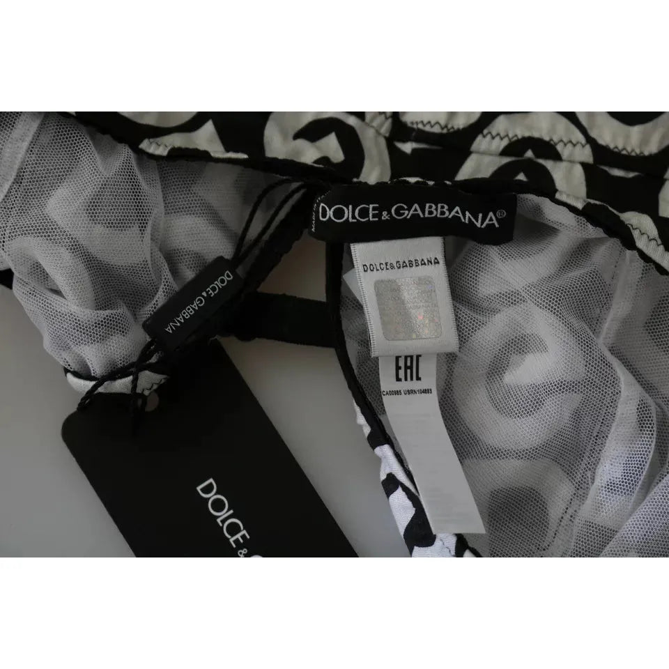 ملابس سباحة بدون أكمام بطبعة DG Mania باللون الأسود من Dolce &amp; Gabbana