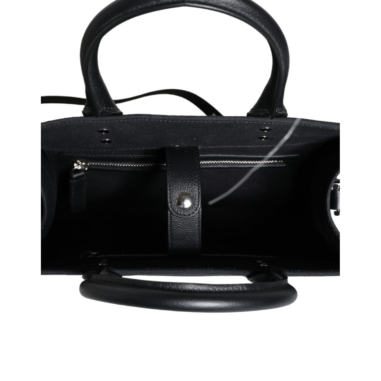 Front view with bag zipped and handles upright.