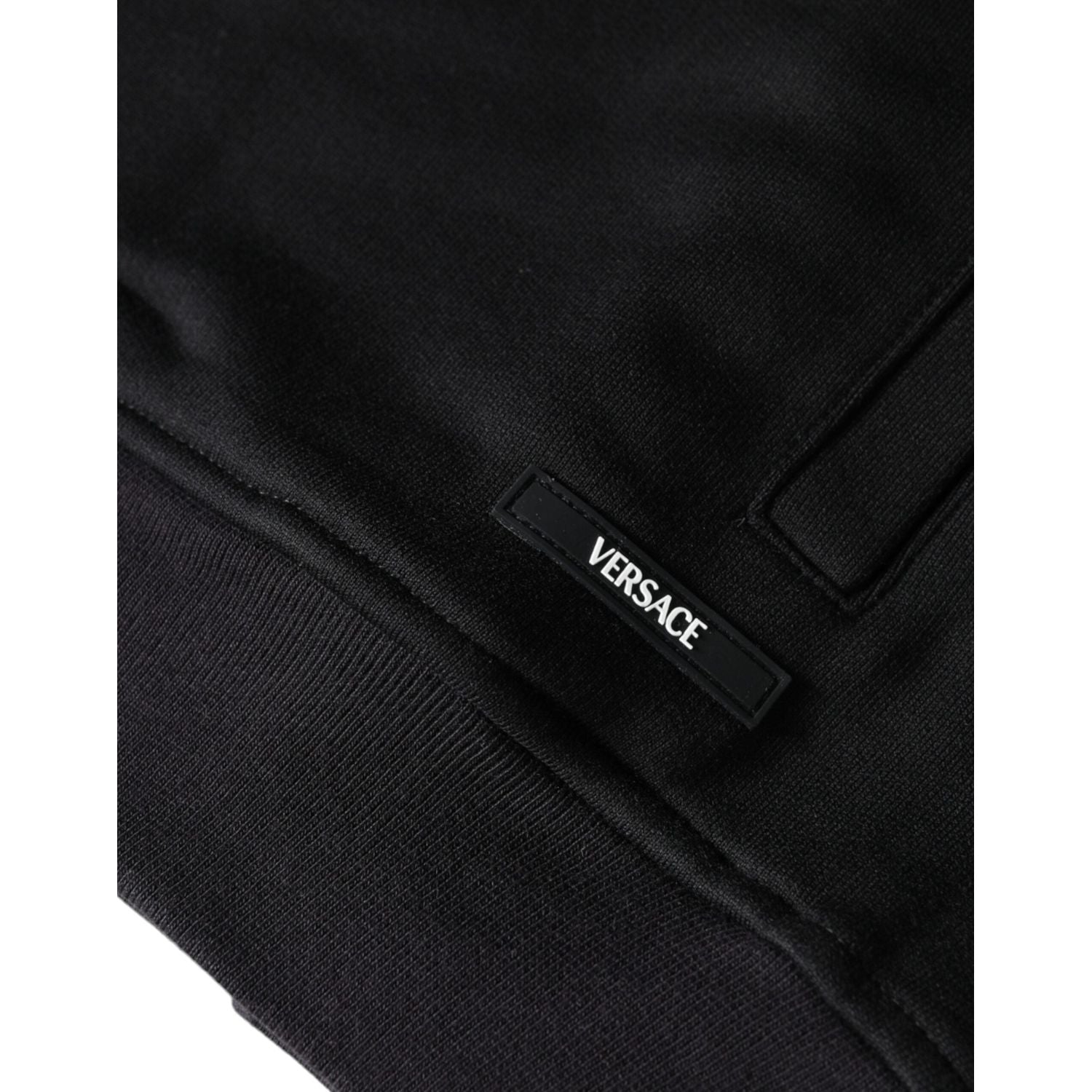 سويت شيرت بغطاء رأس وسحّاب كامل من القطن بطبعة ميدوسا باللون الأسود من فيرساتشي