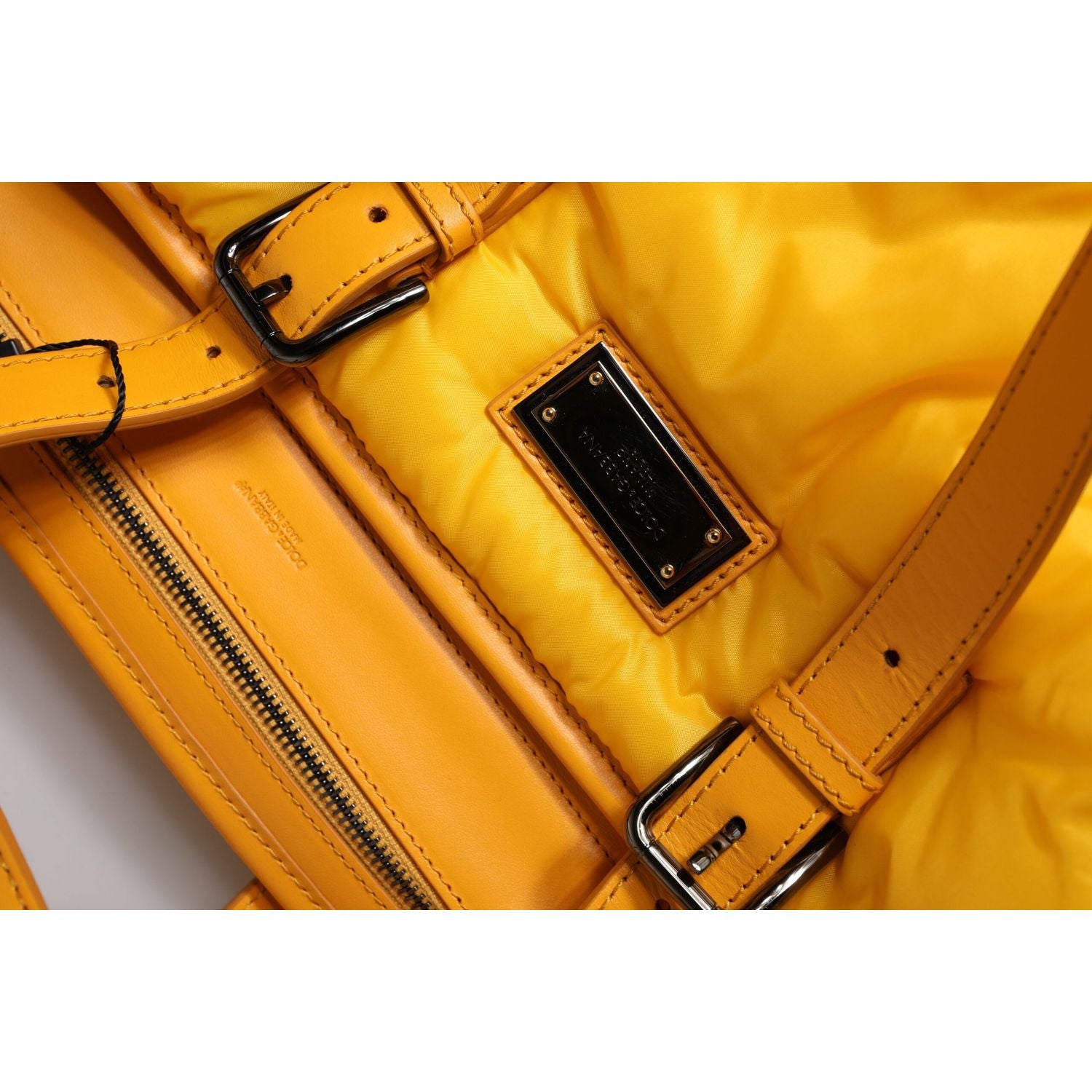 Front view with bag zipped and handles upright.