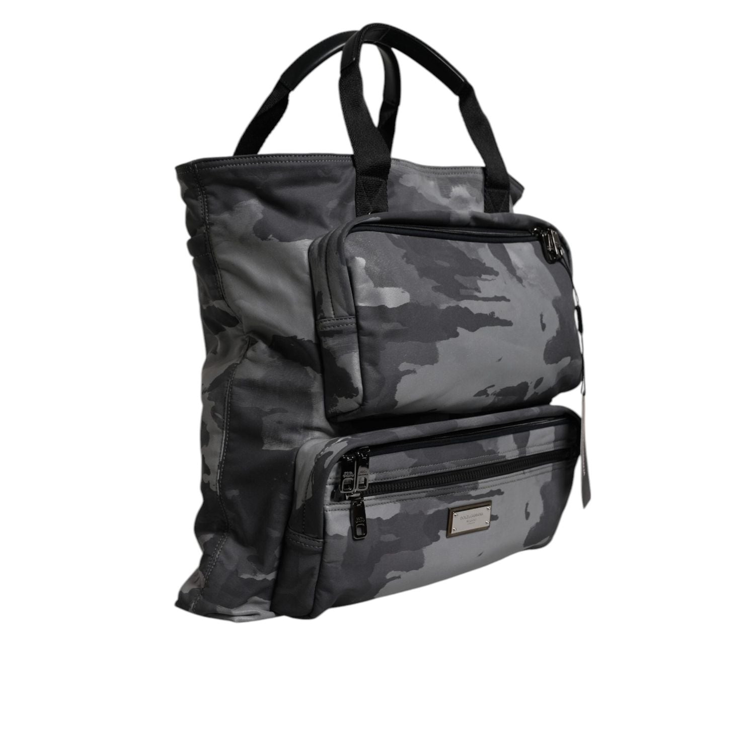 Front view with bag zipped and handles upright.