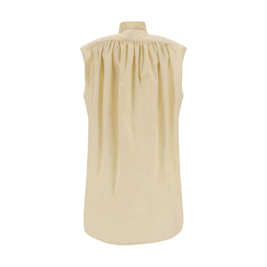 Quira Sleeveless Shirt with mandarin collar, elegant vintage design, and side slits. Monochrome cotton for a sophisticated look.