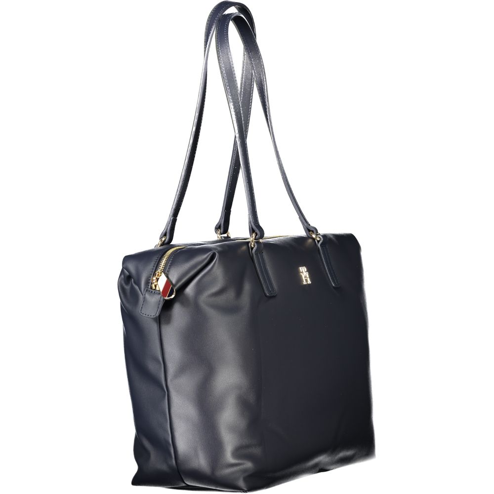 Front view with bag zipped and handles upright.