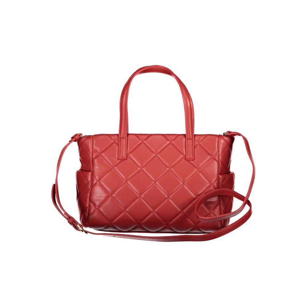 Front view with bag zipped and handles upright.