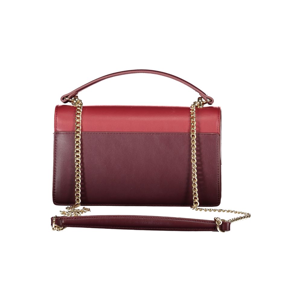 Front view with bag zipped and handles upright.