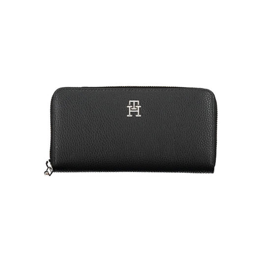 Tommy Hilfiger Black Polyethylene Women Wallet with zip closure, showcasing luxury and organization in sleek black design.