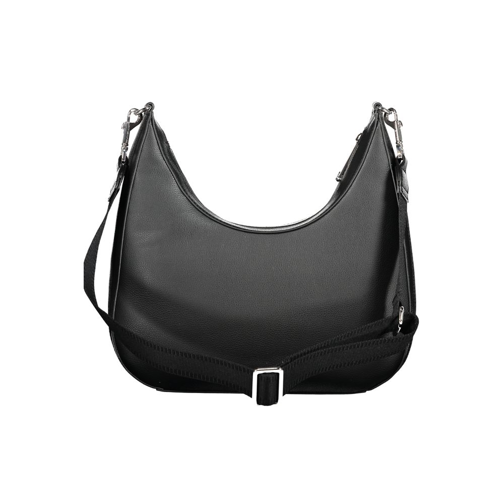 Front view with bag zipped and handles upright.