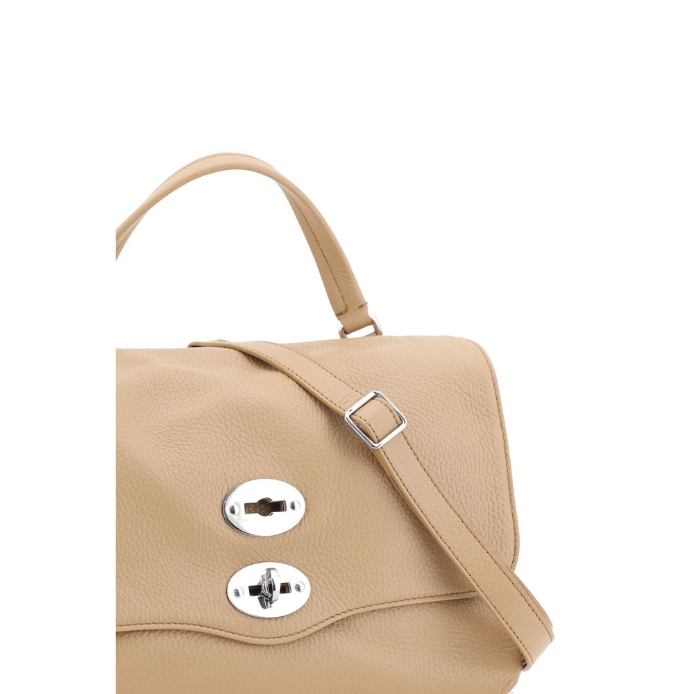 Front view with bag zipped and handles upright.