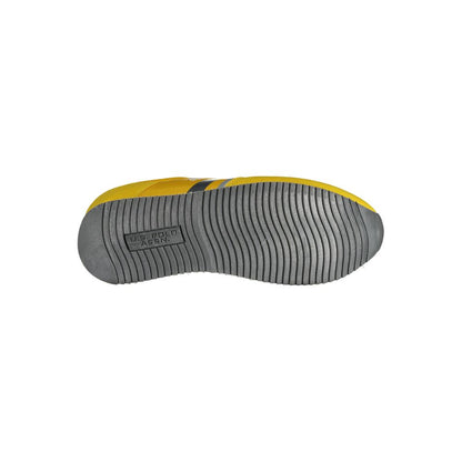 Sole view of U.S. POLO ASSN. Yellow Polyester Men Sneaker, highlighting sturdy design and logo details.