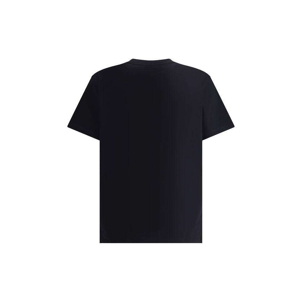 Moschino Black Cotton T-Shirt with ribbed crew neck and bold front monogram, perfect for an impactful and stylish look. Made in Portugal.