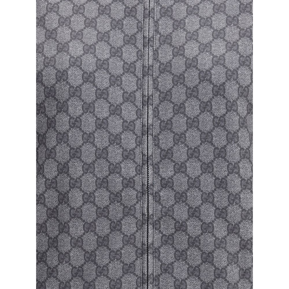 Close-up of Gucci Gray Polyester Sweatshirt with all-over GG motif and front zipper, showcasing luxury sporty elegance.