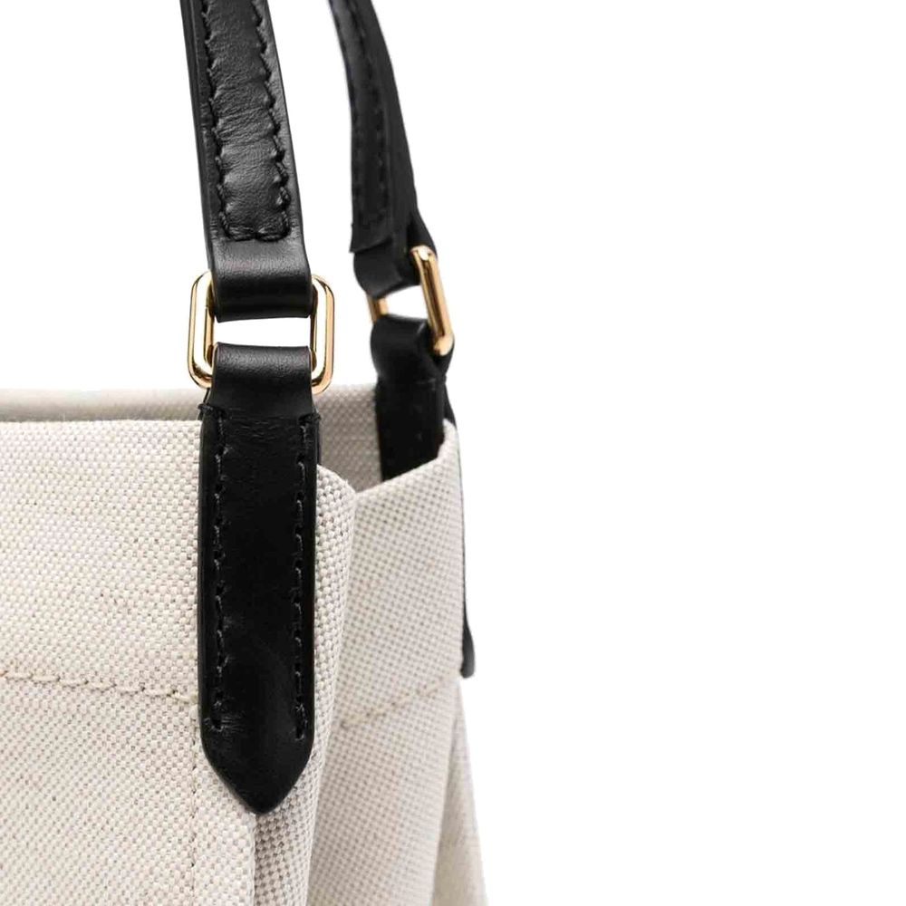 Front view with bag zipped and handles upright.