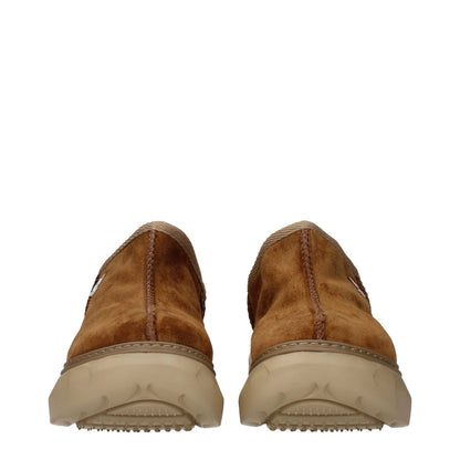 Back view of Givenchy Brown Leather Slippers made from suede with rubber sole and mid heel.