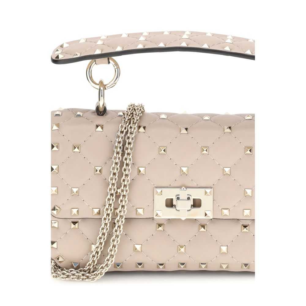 Valentino Garavani Multicolor Calf Leather Bos Taurus Handbag with rockstuds, flat studded shoulder strap, and front swivel closure.